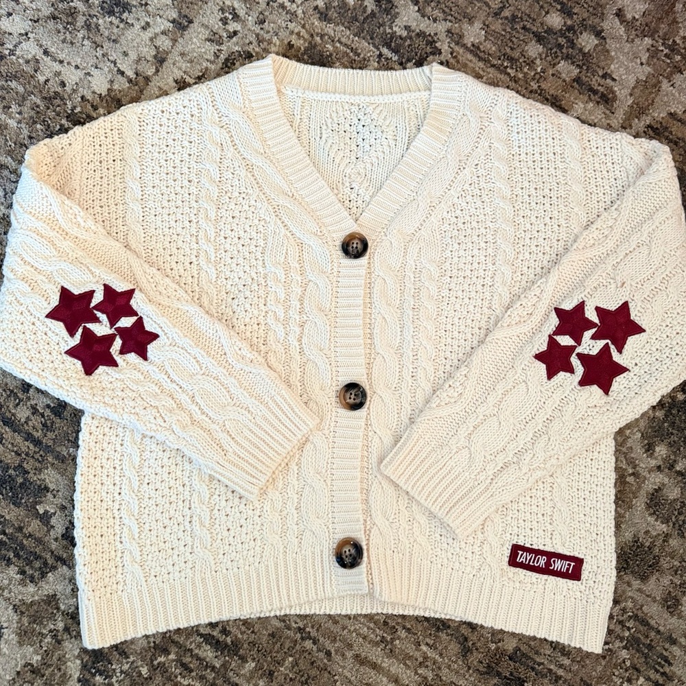 Taylor Swift Cream Cardigan with Red Star Accents